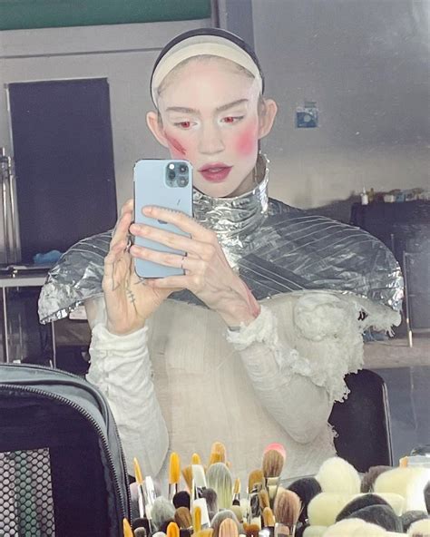 Grimes is debating a face tattoo: 'Feels like it's time'