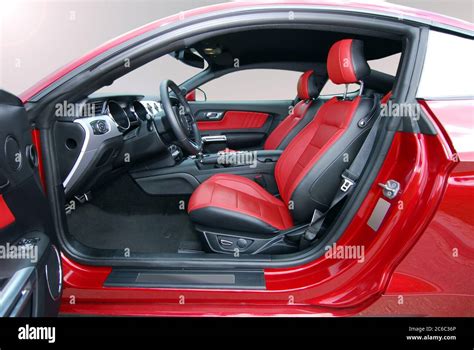 Interior of a sports car. Red leather interior of luxury red sport car Stock Photo - Alamy