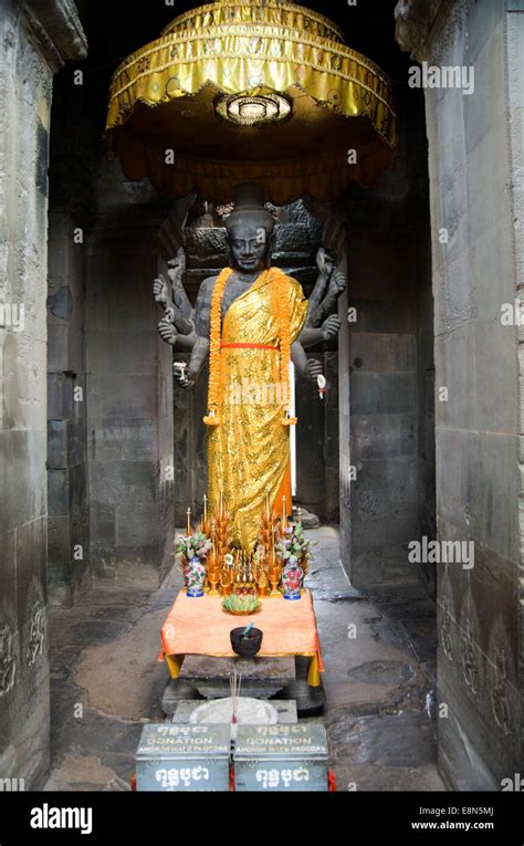 Hindu god altar inside Angkor wat Temple Stock Photo - Alamy