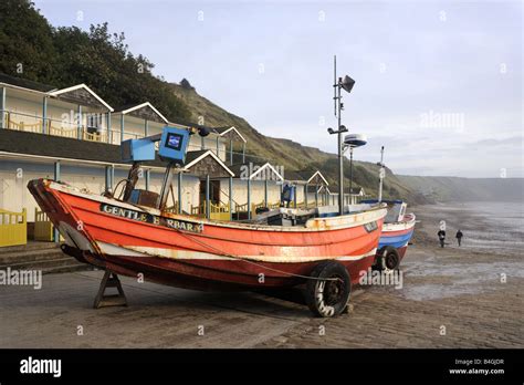 Fishing boats, early morning, on Filey seafront, Yorkshire Stock Photo - Alamy