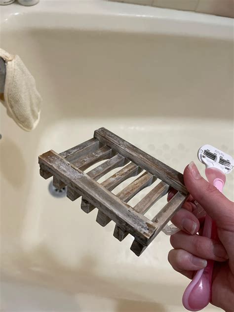 Wooden soap dish ravaged by hard water : r/CleaningTips