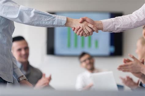 business womans handshake 12414862 Stock Photo at Vecteezy