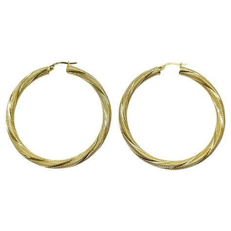 Yellow Gold Bow Hoop Earrings For Sale at 1stDibs | gold bow hoops, bow hoop earrings gold, gold ...