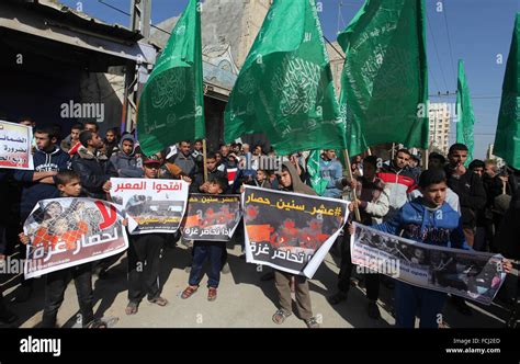 Gaza, Palestine. 22nd Jan, 2016. Demonstrators holding green flag with ...