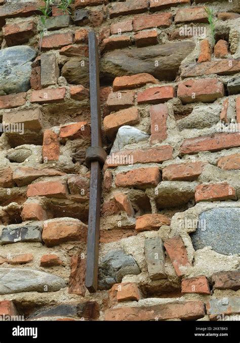 Old and cracked brick wall background closeup Stock Photo - Alamy