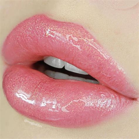 Fun fact, Lip gloss was invented by Max Factor in 1930 to make the lips look shiny or glossy for ...