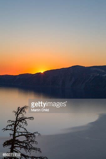 Crater Lake At Sunrise High-Res Stock Photo - Getty Images