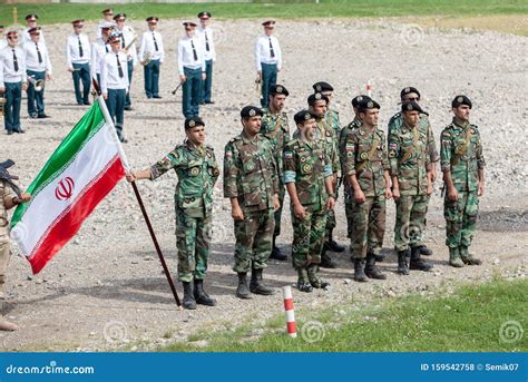 Platoon of Soldiers of the Iranian Army with the Flag of the Islamic Republic of Iran Editorial ...