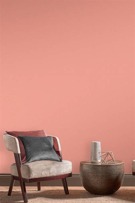 Stunning coral pink paint colour by Graham & Brown.