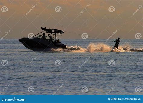 Sunset Water Skier / Skiing Stock Photo - Image of wake, splash: 33284462