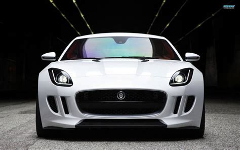 Download Stylish Modern White Jaguar Car Wallpaper | Wallpapers.com