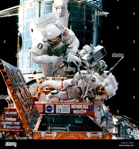 Astronauts Working In Space Stock Photo - Alamy