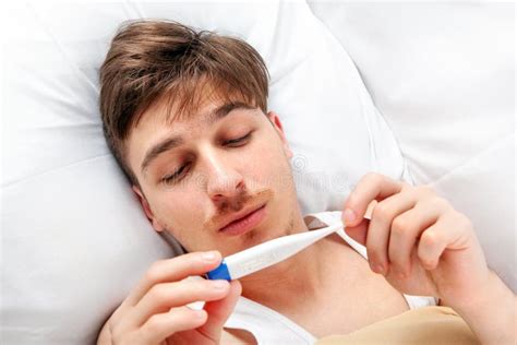 Sick Man with a Thermometer Stock Image - Image of problem, illness ...