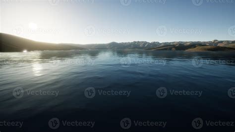 Beautiful calm lake with sunset 5764820 Stock Photo at Vecteezy