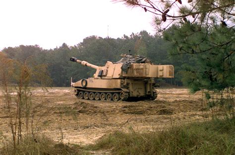 A M109A6 Paladin 155mm self-propelled howitzer stands on the firing range - PICRYL - Public ...