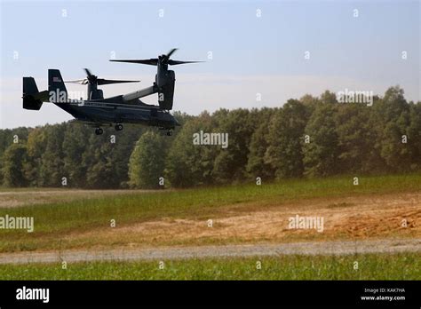 A U.S. Marine Corps MV-22B Osprey lands at a landing zone to transport Marines Stock Photo - Alamy