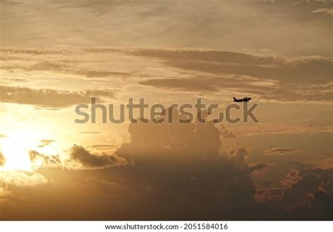 Plane Taking Off Into Sunset Stock Photo 2051584016 | Shutterstock