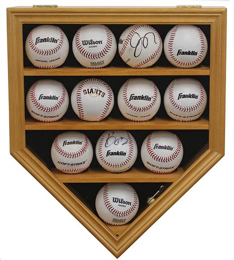 This home plate shaped display case holds 12 pro sized balls. Made from ...