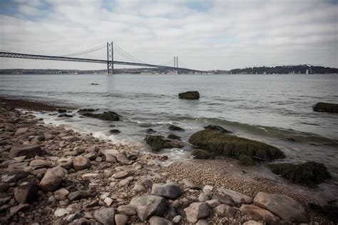 Premium AI Image | A bridge over the tagus river in lisbon