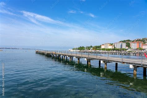 Portoroz central beach with pier and resort buildings Stock Photo ...