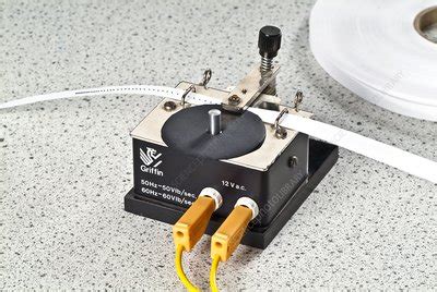 Ticker tape timer experiment - Stock Image - C007/0872 - Science Photo Library