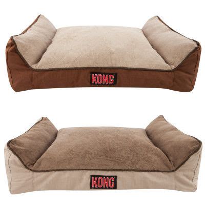 two dog beds with the word kong written on them and one has a brown pillow