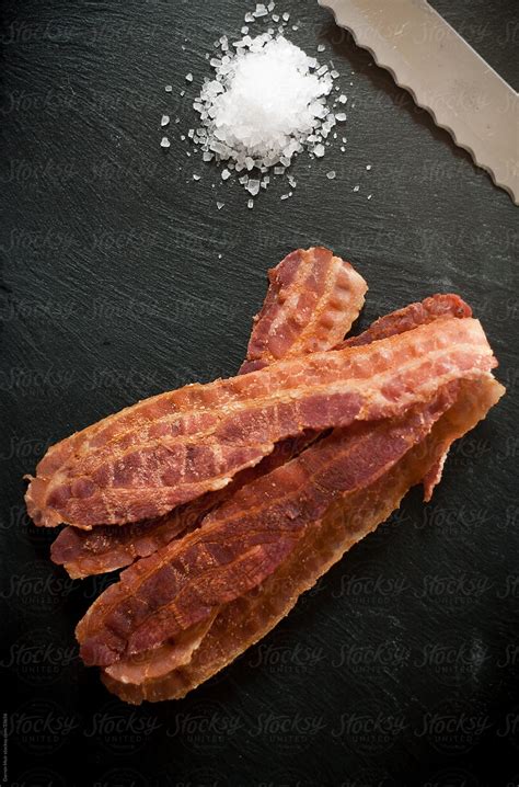 "Crispy Bacon." by Stocksy Contributor "Darren Muir" - Stocksy