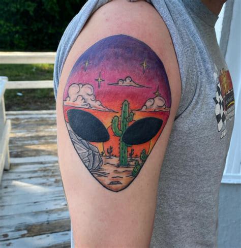 15 Alien Head Tattoo Designs That Are Out of This World - Psycho Tats