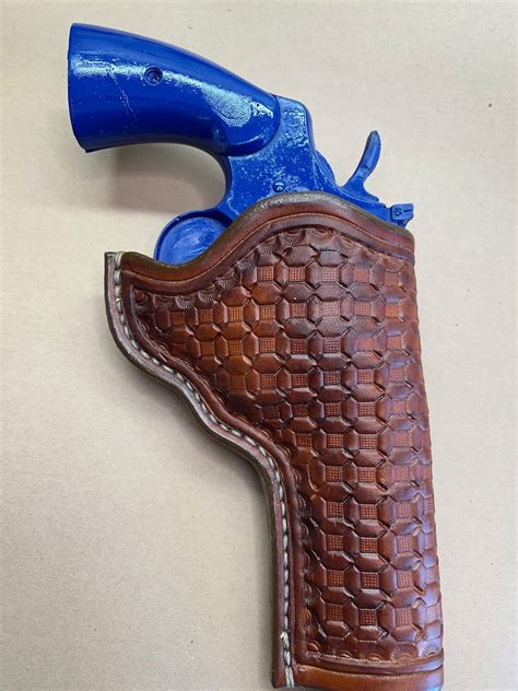 The classic Holster for a Colt Python 4.25 Barrel.. Handmade in the USA From Saddle Leather ...