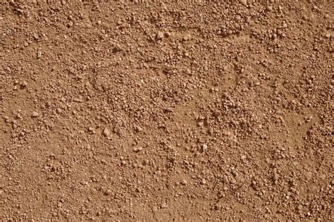 Premium Photo | Dark coarse sand texture background