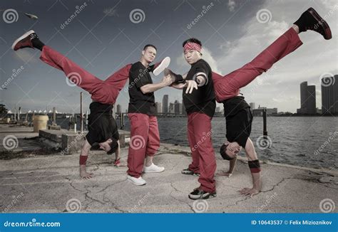 Group of Guys Performing Acrobatic Stunts Stock Image - Image of exercising, gymnastic: 10643537