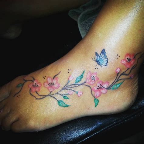 Women Tattoo - colourful girly foot tattoo, butterflies flowers and ...