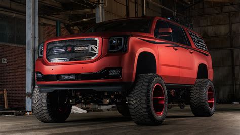 Lifted GMC Yukon With Chrome Red Vinyl Wrap — CARiD.com Gallery