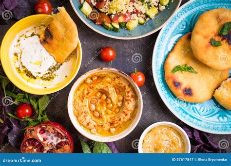 Table Served with Middle Eastern Vegetarian Dishes. Hummus, Tahi Stock Image - Image of greek ...