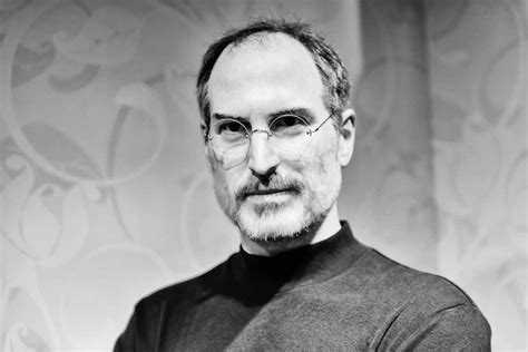 a black and white photo of steve jobs