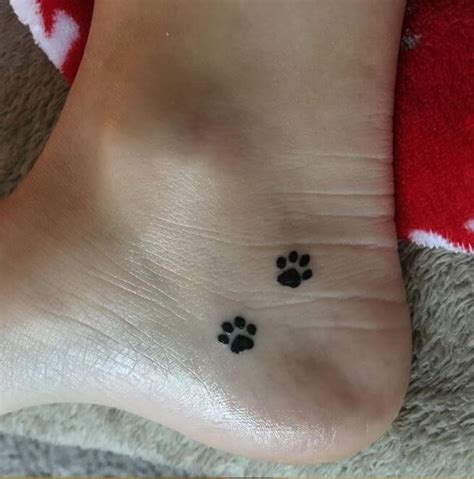 50 Amazing Paw Print Tattoo Ideas for Pet Lovers (2018) - TattoosBoyGirl