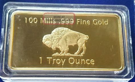 1 Troy Ounce Gold Buffalo Bar 100 Mills Clad. 999 24k Bullion Bar.