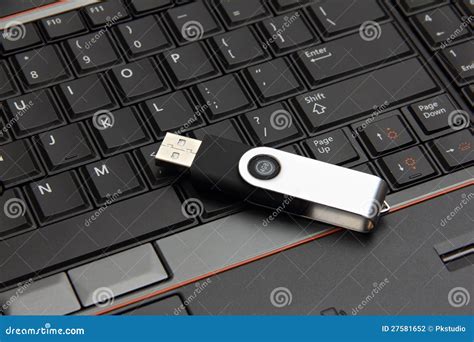 USB Thumb Drive on a Laptop Stock Photo - Image of computer, user: 27581652