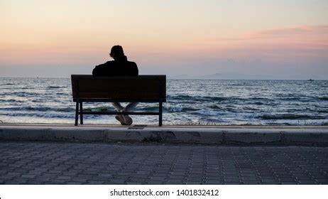 Young Sad Depressed Man Sitting Alone Stock Photo 1401832412 | Shutterstock