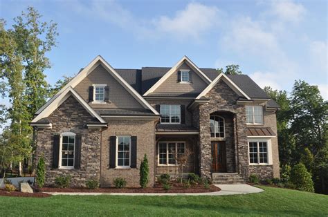 Exterior with stone, brick, and siding. | Brick house plans, Brick exterior house, House designs ...