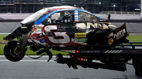 Nascar Crashes: Photos: NASCAR crash sends car into fencing