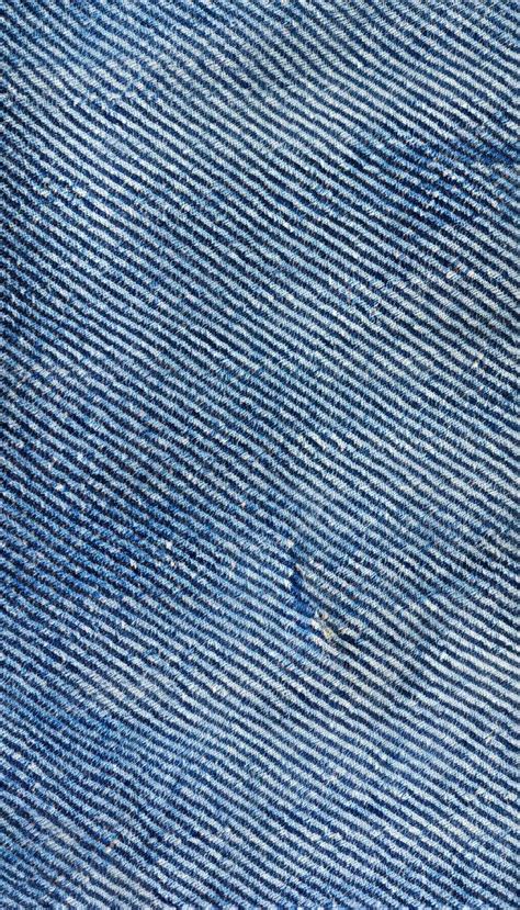 Premium AI Image | Jeans fabric texture background generative ai