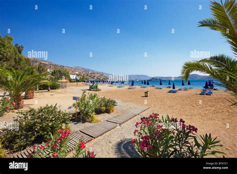 View of sandy Elounda Beach. Elounda village, Crete, Greece Stock Photo - Alamy