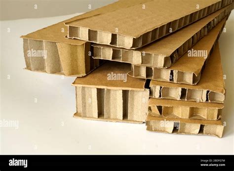 Sheets of brown corrugated cardboard used for filling in fragile parcels. Rigid double wall ...