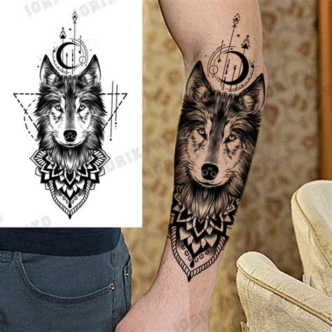 Details 84+ wolf and moon tattoo best - in.coedo.com.vn