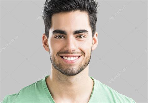 Handsome man smiling — Stock Photo © ikostudio #75196567