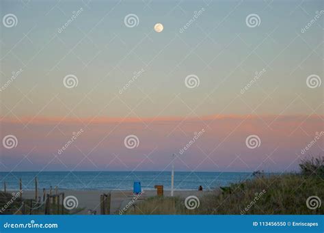 Moon at Sunset in the Beach Stock Photo - Image of nature, ocean: 113456550