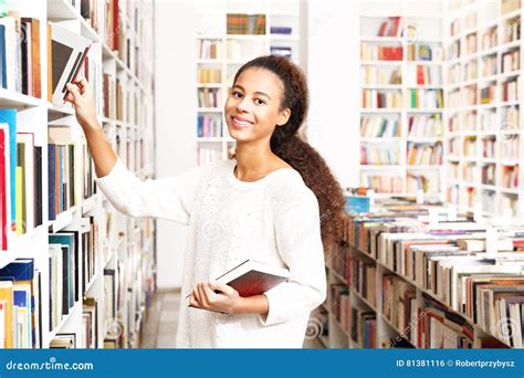 Borrowing Books at the Library. Stock Photo - Image of looking, buying: 81381116