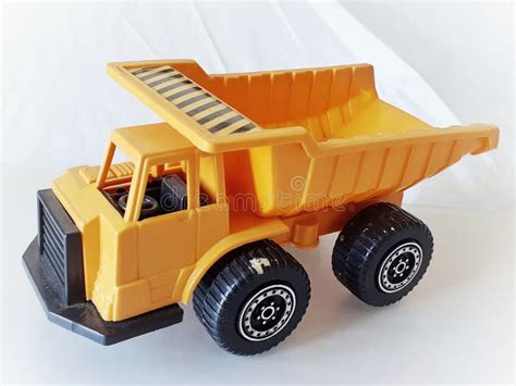 Toy Dump Truck. Yellow Dump Truck. Stock Photo - Image of contractor, playing: 176926960