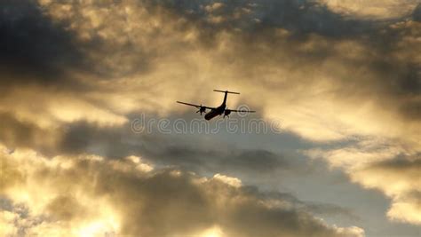 Silhouette of an Airplane Flying at Sunset Clouds. Stock Image - Image of destination, airplane ...